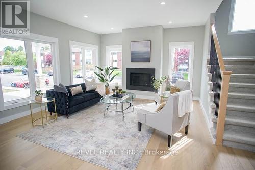 7A Yeager Avenue, Norfolk, ON - Indoor Photo Showing Living Room With Fireplace