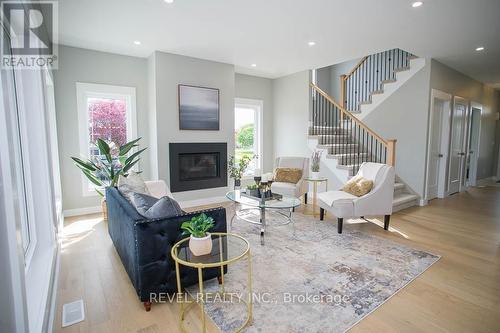 7A Yeager Avenue, Norfolk, ON - Indoor Photo Showing Living Room With Fireplace