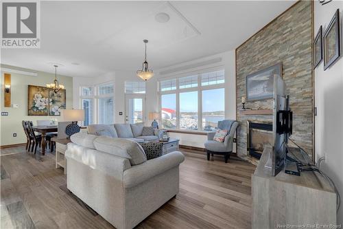 7 Long Beach Lane, Dipper Harbour, NB - Indoor Photo Showing Living Room With Fireplace