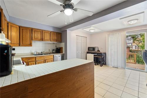 127 Grosvenor Avenue N, Hamilton, ON - Indoor Photo Showing Kitchen With Double Sink