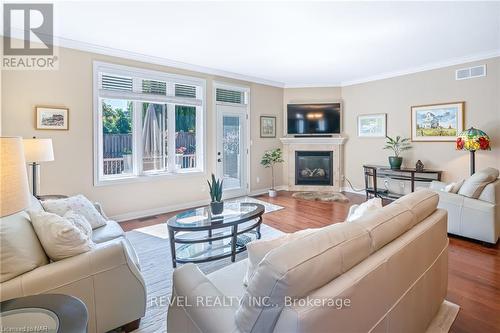 33 Hickory Avenue, Niagara-On-The-Lake, ON - Indoor Photo Showing Living Room With Fireplace