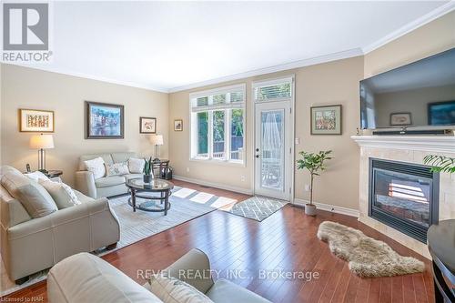 33 Hickory Avenue, Niagara-On-The-Lake, ON - Indoor Photo Showing Living Room With Fireplace