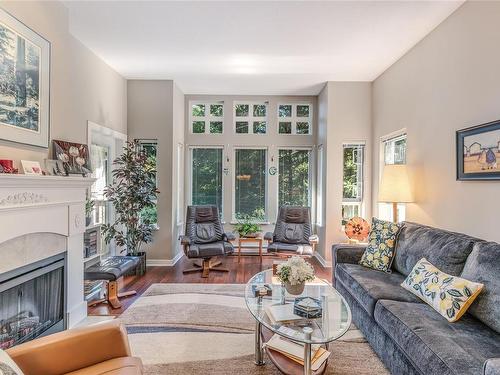 311-5660 Edgewater Lane, Nanaimo, BC - Indoor Photo Showing Living Room With Fireplace