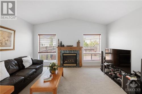 211 Mountshannon Drive, Ottawa, ON - Indoor Photo Showing Living Room With Fireplace