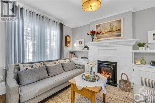 48 Clarey Avenue, Ottawa, ON - Indoor Photo Showing Living Room With Fireplace