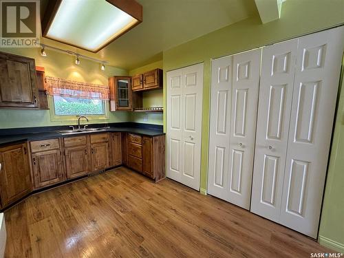 220 2Nd Street E, Dinsmore, SK - Indoor Photo Showing Kitchen With Double Sink