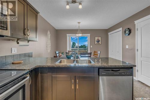 505 3830 Dewdney Avenue E, Regina, SK - Indoor Photo Showing Kitchen With Double Sink