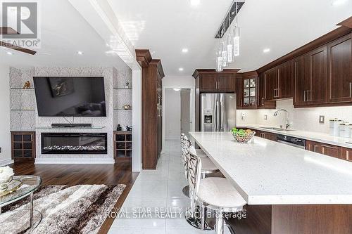 7 Springtown Trail, Brampton (Sandringham-Wellington), ON - Indoor Photo Showing Kitchen With Fireplace With Upgraded Kitchen