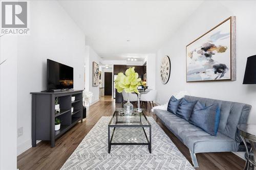 1305 - 50 Absolute Avenue, Mississauga, ON - Indoor Photo Showing Living Room