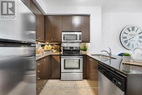 1305 - 50 Absolute Avenue, Mississauga, ON - Indoor Photo Showing Kitchen With Double Sink