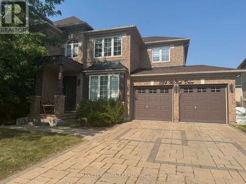 1054 Mcneil Drive, Milton, ON - Outdoor With Facade