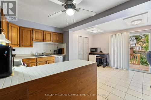 127 Grosvenor Avenue N, Hamilton, ON - Indoor Photo Showing Kitchen With Double Sink