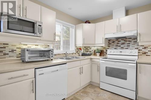 23 - 1600 Mickleborough Drive W, London, ON - Indoor Photo Showing Kitchen With Double Sink