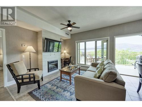 1200 Rancher Creek Road Unit# 32C, Osoyoos, BC - Indoor Photo Showing Living Room With Fireplace