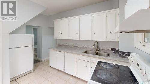 1317 Athol Street, Regina, SK - Indoor Photo Showing Kitchen With Double Sink