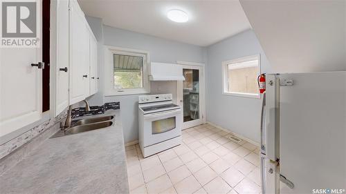 1317 Athol Street, Regina, SK - Indoor Photo Showing Kitchen With Double Sink