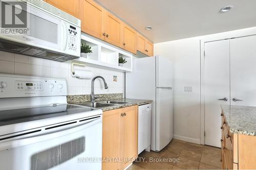 409 - 8 York Street, Toronto, ON - Indoor Photo Showing Kitchen With Double Sink