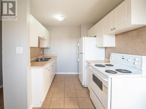 5498 Lassaline Street, Windsor, ON - Indoor Photo Showing Kitchen With Double Sink