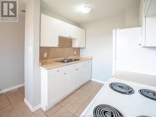 5498 Lassaline Street, Windsor, ON - Indoor Photo Showing Kitchen With Double Sink