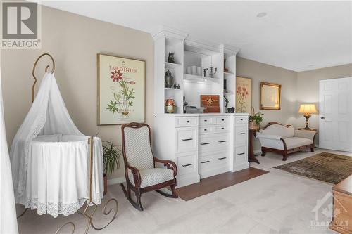 Custom, built-in cabinet with drawers and shelving installed in 2021. - 74 Trailway Circle, Ottawa, ON - Indoor Photo Showing Bedroom