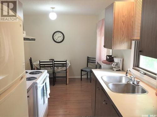 534 Main Street, Hudson Bay, SK - Indoor Photo Showing Kitchen With Double Sink