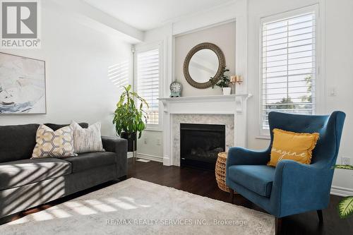 1308 Leger Way, Milton (Ford), ON - Indoor Photo Showing Living Room With Fireplace