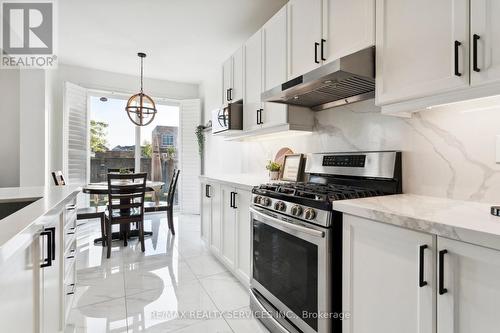 1308 Leger Way, Milton (Ford), ON - Indoor Photo Showing Kitchen With Upgraded Kitchen