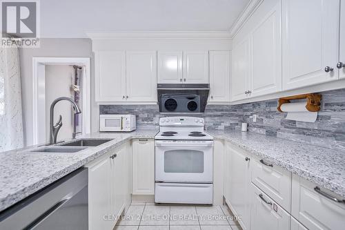 12 Featherstone Avenue, Markham, ON - Indoor Photo Showing Kitchen With Double Sink