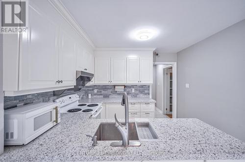 12 Featherstone Avenue, Markham, ON - Indoor Photo Showing Kitchen With Double Sink