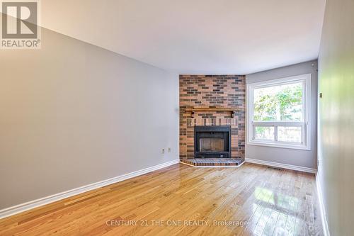 12 Featherstone Avenue, Markham, ON - Indoor Photo Showing Living Room With Fireplace