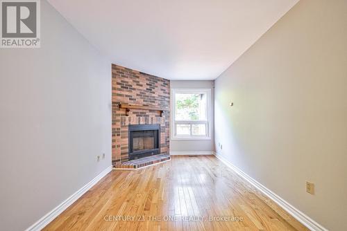 12 Featherstone Avenue, Markham, ON - Indoor Photo Showing Living Room With Fireplace