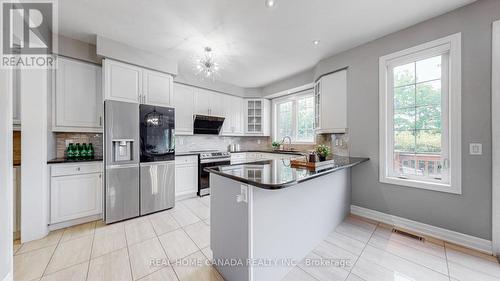 617 Wettlaufer Terrace, Milton, ON - Indoor Photo Showing Kitchen With Upgraded Kitchen