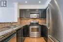 102 - 9 Michael Power Place, Toronto (Islington-City Centre West), ON  - Indoor Photo Showing Kitchen With Stainless Steel Kitchen With Double Sink With Upgraded Kitchen 