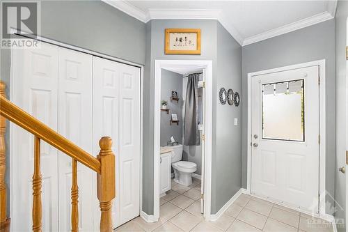 The front foyer is big enough to get inside, get your boots off and not trip all over each other, The powder room right off the entry is a bonus as well. - 36 Crampton Drive, Carleton Place, ON 