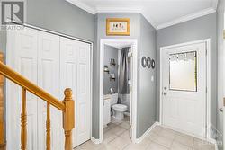 The front foyer is big enough to get inside, get your boots off and not trip all over each other, The powder room right off the entry is a bonus as well. - 