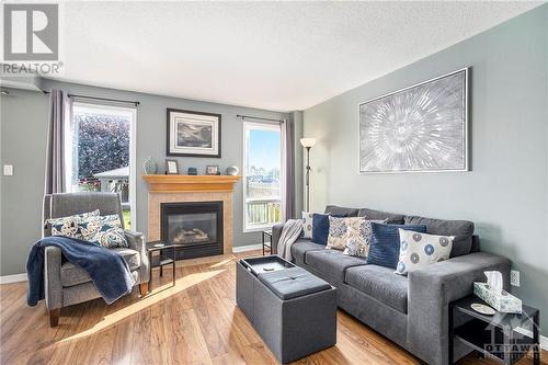 There’s something great about having 2 big windows and a patio door to watch the weather while at the same time cranking up that gas fireplace. - 36 Crampton Drive, Carleton Place, ON 