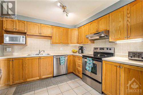 Seriously check out the size of this kitchen!! There’s so may cupboards and so much counter space. - 36 Crampton Drive, Carleton Place, ON 