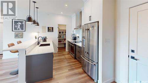 416 3581 Evans Court, Regina, SK - Indoor Photo Showing Kitchen With Upgraded Kitchen