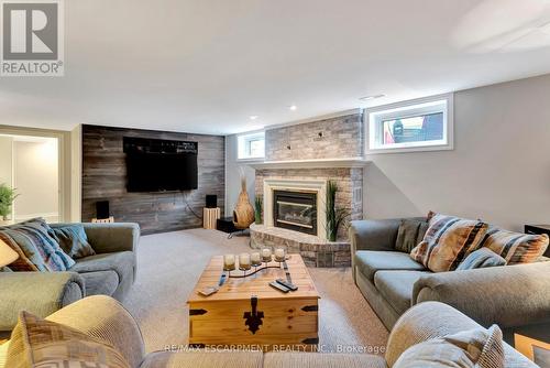 135 Welbourn Drive, Hamilton, ON - Indoor Photo Showing Living Room With Fireplace