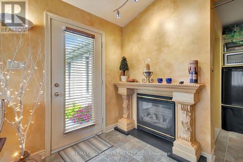 135 Welbourn Drive, Hamilton, ON - Indoor With Fireplace