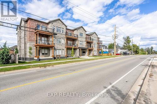 303 - 163 Port Robinson Road, Pelham, ON - Outdoor With Balcony With Facade