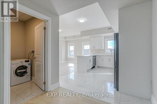 303 - 163 Port Robinson Road, Pelham, ON - Indoor Photo Showing Laundry Room