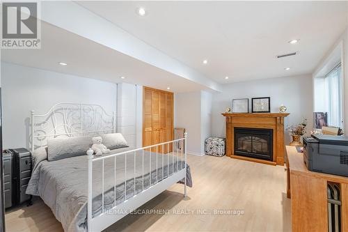 8045 Appleby Line, Milton (Nassagaweya), ON - Indoor Photo Showing Bedroom With Fireplace