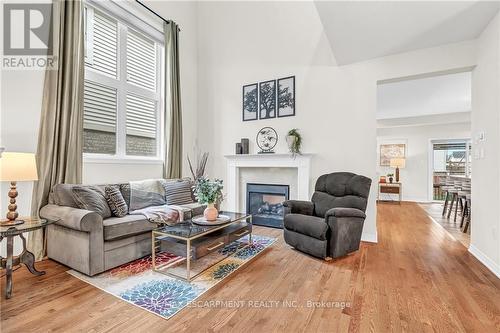 92 Cutts Crescent, Hamilton (Binbrook), ON - Indoor Photo Showing Living Room With Fireplace