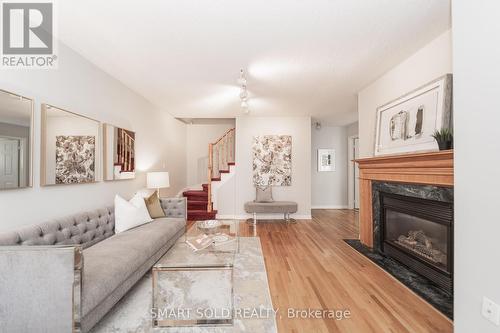 1009 - 29 Rosebank Drive, Toronto (Malvern), ON - Indoor Photo Showing Living Room With Fireplace