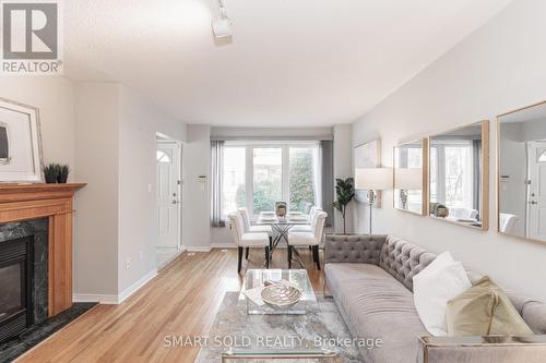 1009 - 29 Rosebank Drive, Toronto (Malvern), ON - Indoor Photo Showing Living Room With Fireplace