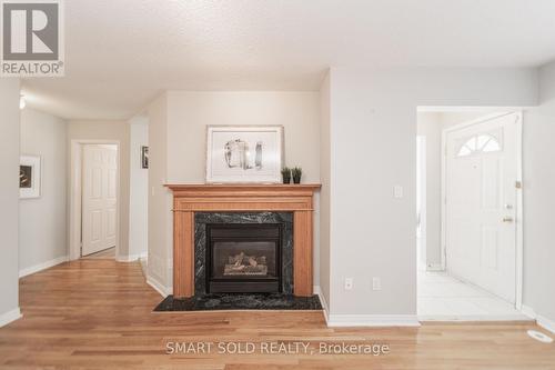 1009 - 29 Rosebank Drive, Toronto (Malvern), ON - Indoor Photo Showing Living Room With Fireplace