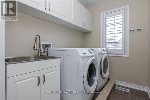 30 Michaelis Street, New Tecumseth, ON - Indoor Photo Showing Laundry Room