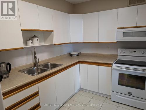 702 - 15 La Rose Avenue, Toronto, ON - Indoor Photo Showing Kitchen With Double Sink