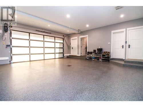 Triple Car Garage with Epoxy Floors - 2043 Airport Way, Revelstoke, BC - Indoor Photo Showing Garage